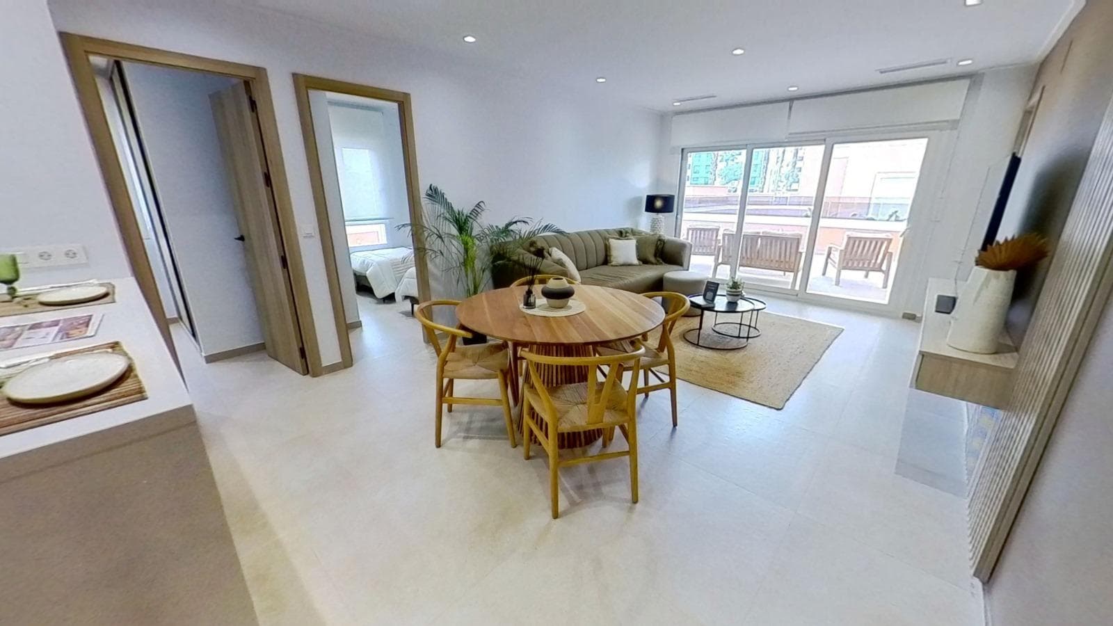 WOHNUNG IM ERDGESCHOSS MIT PRIVATEM GARTEN, GUARDAMAR DEL SEGURA Diese Wohnungen haben 3 S Vorschau 4