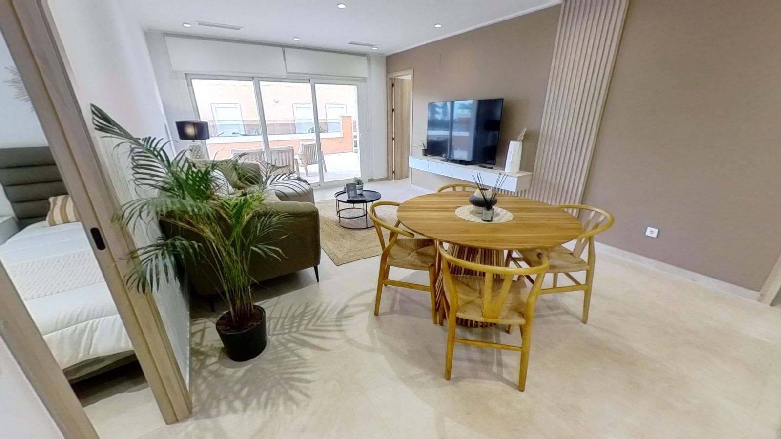 WOHNUNG IM ERDGESCHOSS MIT PRIVATEM GARTEN, GUARDAMAR DEL SEGURA Diese Wohnungen haben 3 S Vorschau 6